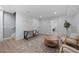 Spacious basement featuring a functional desk area, and stylish seating arrangement at 2815 W 52Nd Ave, Denver, CO 80221