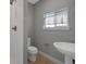 This is a bathroom with white subway tile in the shower and a modern sink at 2815 W 52Nd Ave, Denver, CO 80221