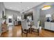Contemporary kitchen and dining area with modern appliances, stylish seating, and ample natural light for culinary enjoyment at 2815 W 52Nd Ave, Denver, CO 80221