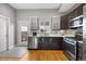 Well-equipped kitchen featuring sleek appliances and modern cabinets, designed for functionality and everyday convenience at 2815 W 52Nd Ave, Denver, CO 80221
