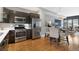 Modern kitchen with stainless steel appliances, sleek cabinets, and ample counter space, offering a functional culinary space at 2815 W 52Nd Ave, Denver, CO 80221