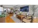 Bright and airy living room with modern decor and an open floor plan, offering a stylish and comfortable living space at 2815 W 52Nd Ave, Denver, CO 80221
