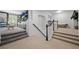 Upstairs hallway with staircase and view of the upper level living spaces at 2062 Hyacinth Rd, Highlands Ranch, CO 80129