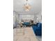 Bright living room featuring modern lighting and stylish furniture at 2062 Hyacinth Rd, Highlands Ranch, CO 80129
