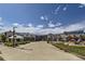 Community view of the Stanley Marketplace in Aurora, Colorado, under a partly cloudy sky at 2185 S Gold Bug Ct, Aurora, CO 80018