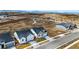 Aerial view of a neighborhood under development with modern homes and construction ongoing at 17196 W 92Nd Loop, Arvada, CO 80007