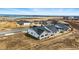 New homes in a developing neighborhood near a lake, showcasing modern design and outdoor spaces at 17196 W 92Nd Loop, Arvada, CO 80007