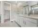Elegant bathroom with dual sinks, modern vanity, and a large mirror for a spa-like experience at 17196 W 92Nd Loop, Arvada, CO 80007