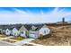 Charming single-Gathering home with a modern exterior, manicured lawn, and attached garage at 17196 W 92Nd Loop, Arvada, CO 80007