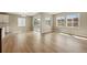 Bright living room featuring sliding glass doors and hardwood floors at 17196 W 92Nd Loop, Arvada, CO 80007