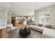 Spacious open layout combining living, dining, and kitchen areas, great for entertaining at 17196 W 92Nd Loop, Arvada, CO 80007
