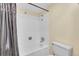 A clean bathroom featuring a shower/tub combo and a standard toilet at 4066 S Atchison Way # 102, Aurora, CO 80014