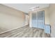 Bright bedroom featuring wood floors and ample storage, creating a serene and inviting atmosphere at 4066 S Atchison Way # 102, Aurora, CO 80014