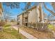 Exterior view of a building with multiple balconies and well-maintained landscaping at 4066 S Atchison Way # 102, Aurora, CO 80014