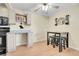 Dining area featuring a table with stools, offering a cozy space for dining and entertaining at 4066 S Atchison Way # 102, Aurora, CO 80014