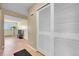 Bright hallway with hardwood floors, closet and open view at 4066 S Atchison Way # 102, Aurora, CO 80014