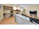 Comfortable living room with desk and hardwood floors at 4066 S Atchison Way # 102, Aurora, CO 80014