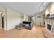 Bright living room with fireplace and sliding glass door at 4066 S Atchison Way # 102, Aurora, CO 80014