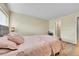 Comfortable main bedroom showcasing wood floors, offering a calming retreat at 4066 S Atchison Way # 102, Aurora, CO 80014