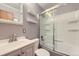 Bathroom with shower/tub combo and vanity at 4855 Dover St, Arvada, CO 80002