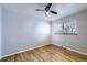 Light grey walls and hardwood floors in bedroom at 4855 Dover St, Arvada, CO 80002