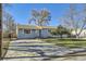 Nice curb appeal, freshly painted gray home at 4855 Dover St, Arvada, CO 80002