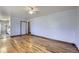 Hardwood floor living room, view of kitchen at 4855 Dover St, Arvada, CO 80002