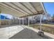 Covered patio with backyard access at 4855 Dover St, Arvada, CO 80002