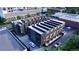 Aerial view showcasing modern townhomes with private garages and contemporary design at 1642 N Lafayette St # 2, Denver, CO 80218