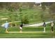 Scenic golf course with players on the green at 1642 N Lafayette St # 2, Denver, CO 80218