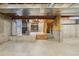 Spacious unfinished basement offers ample storage, water heater, and potential for customization at 5826 Sunburst Ave, Firestone, CO 80504