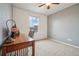 Simple room that features a window for natural light with a desk to utilize as an office space at 5826 Sunburst Ave, Firestone, CO 80504