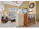 Inviting living room with vaulted ceiling, abundant natural light and stylish furnishings at 5826 Sunburst Ave, Firestone, CO 80504