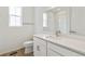 A bright bathroom with a white vanity, modern fixtures, and a shower/tub combo at 6187 E 155Th Pl, Thornton, CO 80602