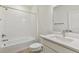 Bathroom featuring a shower over tub, modern sink, and contemporary finishes at 6187 E 155Th Pl, Thornton, CO 80602