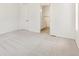 Spacious carpeted bedroom with a bathroom ensuite at 6187 E 155Th Pl, Thornton, CO 80602
