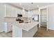 Beautiful kitchen with stainless appliances, bright countertops, and white cabinets at 6187 E 155Th Pl, Thornton, CO 80602