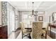 Elegant dining room featuring coffered ceiling and a wooden dining table at 140 Race St, Denver, CO 80206
