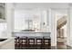 Bright kitchen with stainless steel appliances and a marble countertop island at 140 Race St, Denver, CO 80206