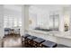 Modern kitchen with stainless steel appliances and marble countertop at 140 Race St, Denver, CO 80206