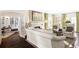 Elegant living room featuring a fireplace, comfortable seating and hardwood floors at 140 Race St, Denver, CO 80206