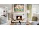 Cozy living room featuring a fireplace, mantel, and comfortable seating at 140 Race St, Denver, CO 80206