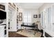 Bright home office with custom built-ins, desk, and natural light at 140 Race St, Denver, CO 80206