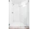 A white-tiled walk-in shower with a glass door at 140 Race St, Denver, CO 80206