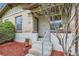 Charming front entrance with manicured landscaping, a modern railing, and updated facade at 1217 E 26Th Ave, Denver, CO 80205