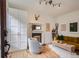 Bright living room with hardwood floors, fireplace, stylish furniture, and decorative accents at 1217 E 26Th Ave, Denver, CO 80205