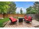 Deck offers seating around a fire pit, perfect for outdoor gatherings at 4720 S Dudley St # 44, Littleton, CO 80123