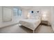 Bedroom featuring carpet floor, a bed with white linens, window and bright lightning at 2777 Ironton St, Denver, CO 80238