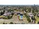 Panoramic aerial view of a property with a pool and large backyard at 9505 Poundstone Pl, Greenwood Village, CO 80111