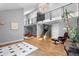 Open foyer with staircase, high ceilings and modern black metal banister at 9505 Poundstone Pl, Greenwood Village, CO 80111